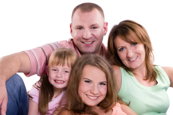 Familia feliz. madre, padre y dos hijas —  Fotos de Stock