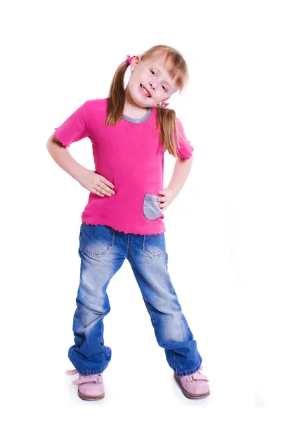 Klein meisje in spijkerbroek op witte achtergrond — Stockfoto