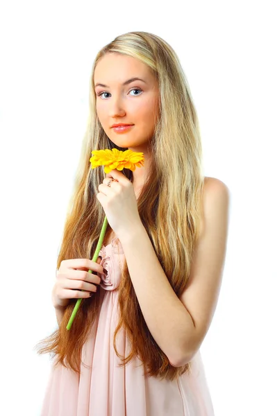 Mujer joven con una flor —  Fotos de Stock