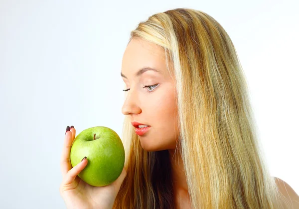 Woman with green apple. — Stock Photo, Image