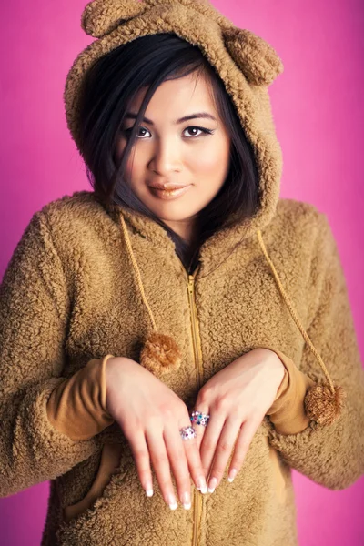 Young japan woman in bear suit — Stock Photo, Image
