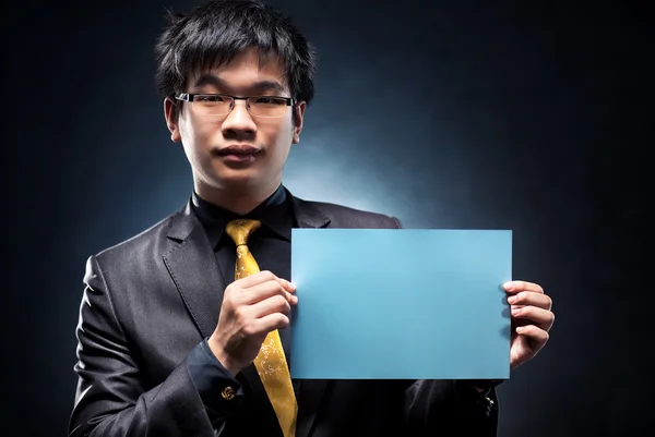Young japan businessman with blank page