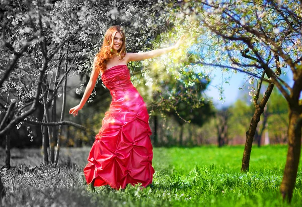 Young fairy woman in red dress — Stock Photo, Image