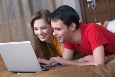 Couple with Laptop clipart