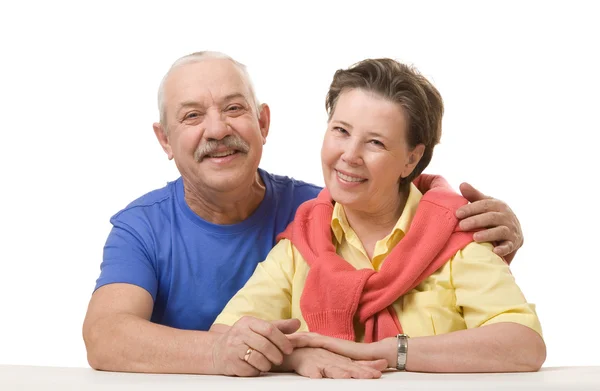 Feliz pareja de ancianos contra fondo blanco Imagen De Stock