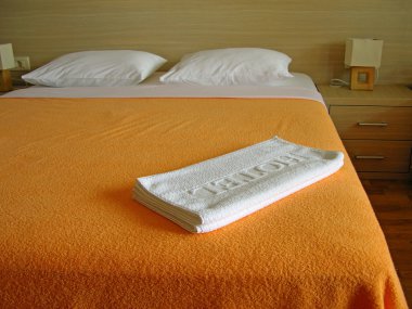 Bed with white towels clipart