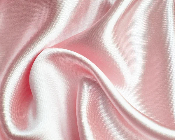 Hladké elegantní růžové hedvábí jako pozadí — Stock fotografie