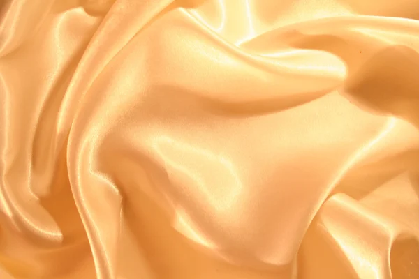 Soepele elegante gouden satijn — Stockfoto