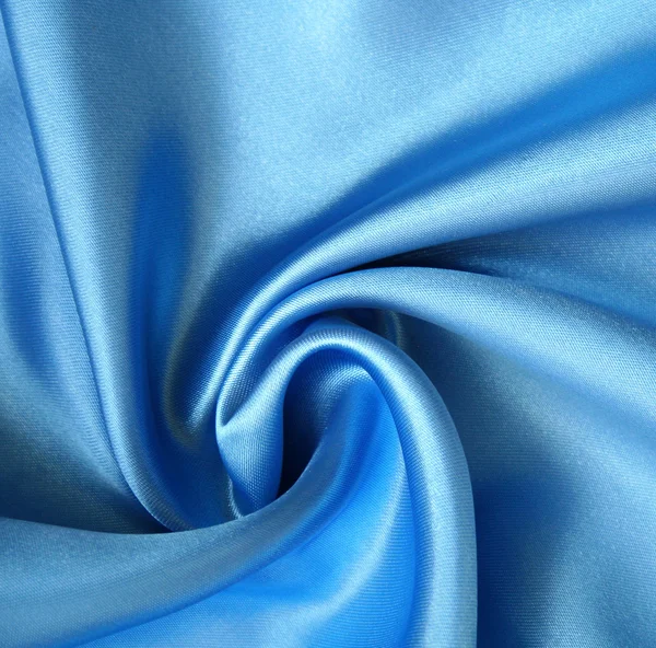 Gładkie elegancki jedwab niebieski jako tło — Zdjęcie stockowe