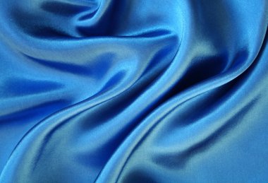 Smooth elegant blue silk as background clipart