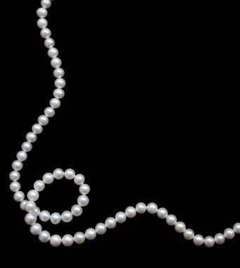 White pearls on the black velvet clipart