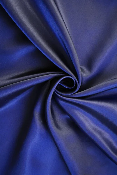 Гладкий элегантный темно-синий шелк — стоковое фото