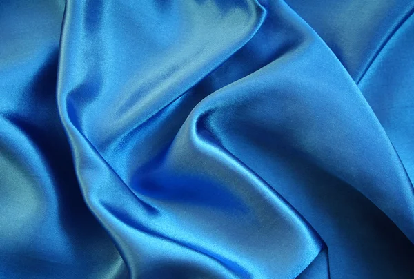 Гладкий елегантний синій шовк — стокове фото