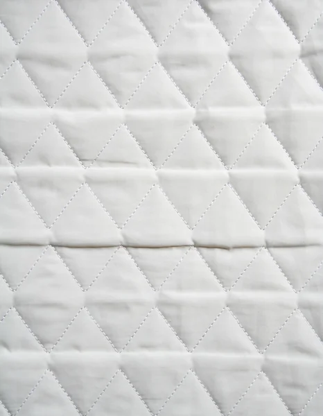 stock image The stitched synthetic white fabric