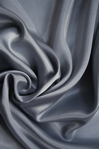 Glatte elegante silbrig graue Seide — Stockfoto