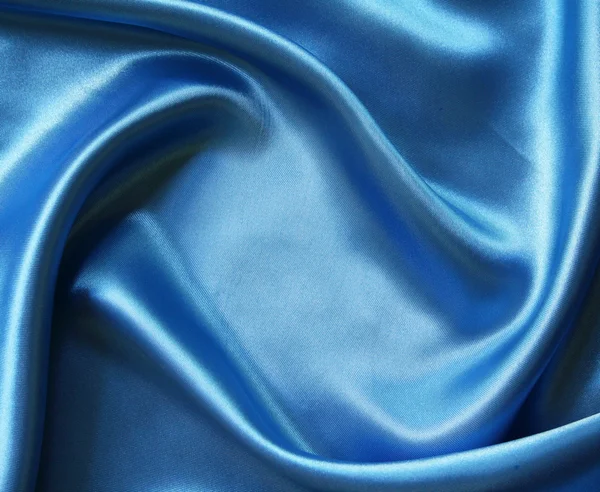 Hladké elegantní modré hedvábí — Stock fotografie