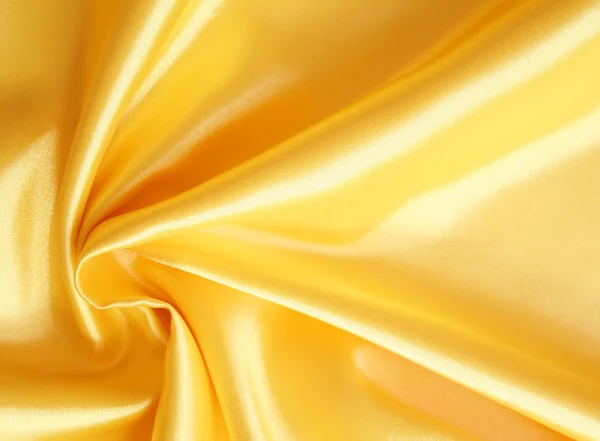 エレガントなゴールデン シルクの滑らかです — ストック写真