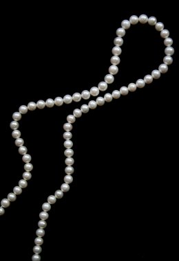 White pearls on the black velvet clipart