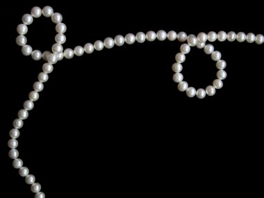 White pearls on the black velvet clipart