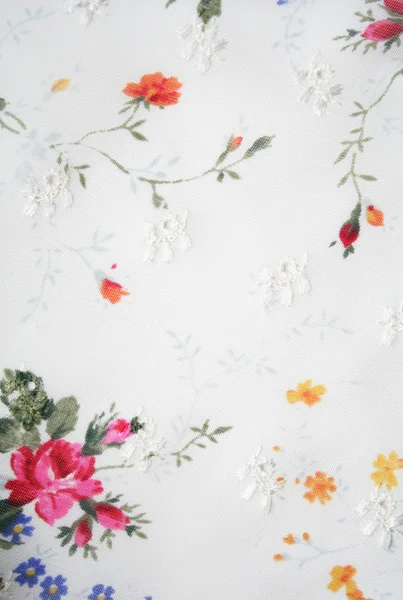 Superfície têxtil com bordado de flores — Fotografia de Stock