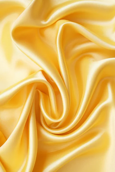 Smooth elegant golden satin — Stock Photo, Image