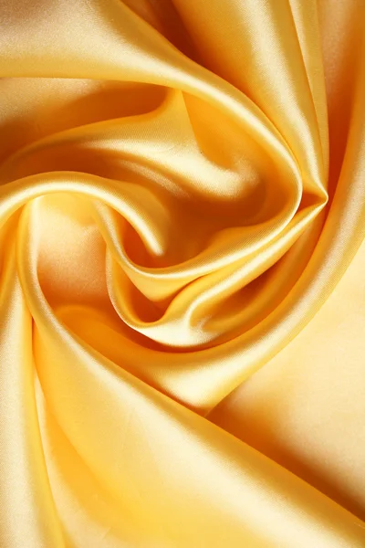 ผ้าซาตินสีทองเรียบหรู — ภาพถ่ายสต็อก