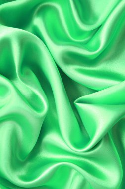 Smooth elegant green silk as background clipart