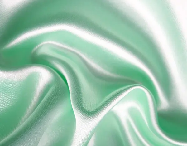 Hladké elegantní zelené hedvábí — Stock fotografie