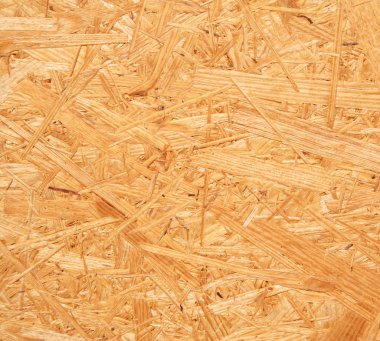 Yellow wood chipboard as background clipart