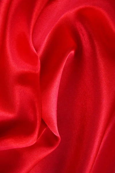 Gładki jedwab czerwony jako tło — Zdjęcie stockowe