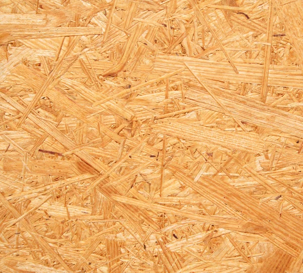 Yellow wood chipboard as background — Stock Photo, Image