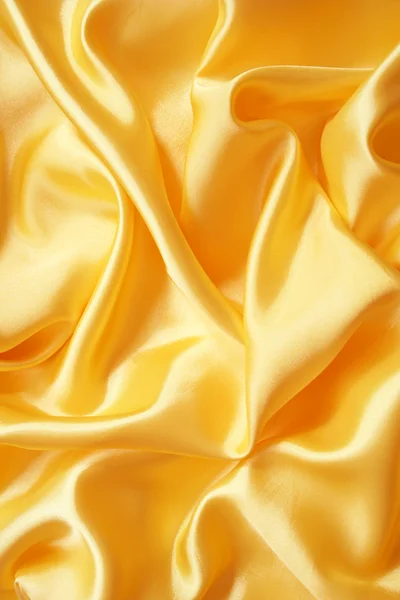 Smooth elegant golden silk — Stock Photo, Image