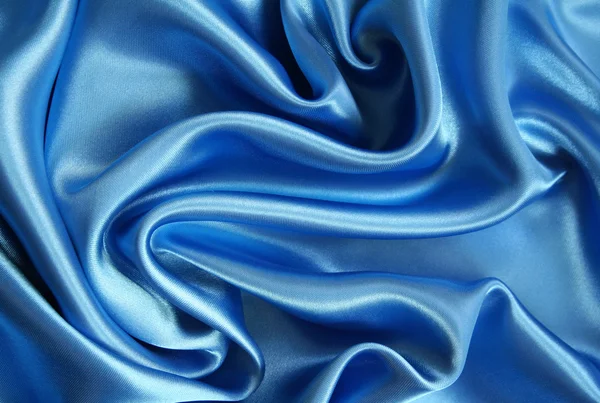 Glatte elegante dunkelblaue Seide — Stockfoto