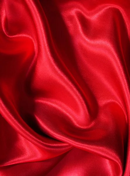 Hladké elegantní červené hedvábí — Stock fotografie