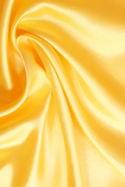 Гладкий елегантний золотий шовк — стокове фото