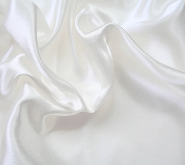 Гладкий элегантный белый шелк — стоковое фото