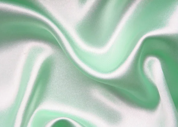 Glatte elegante grüne Seide als Hintergrund — Stockfoto