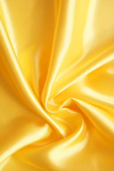 Slät elegant gyllene siden — Stockfoto