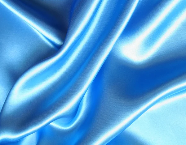 Soepele elegante blauwe zijde — Stockfoto