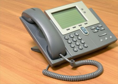 Modern, stationary telephone. clipart