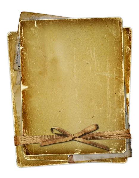 Old page with ribbons and bow — Stock Photo, Image