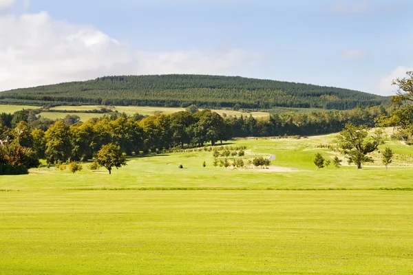 Campo de golf y verdes colinas de Irlanda — Foto de Stock