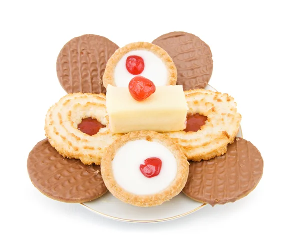 Plate with sweets and cookies — Stock Photo, Image