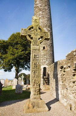 Monasterboice - The Tall Cross and Round Tower clipart