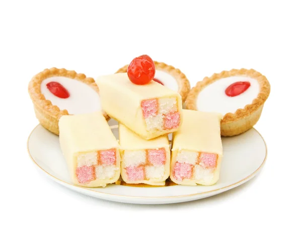 Tasty cakes with cherry on top — Stock Photo, Image