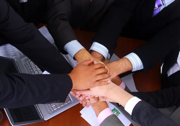 Group of business making a pile — Stock Photo, Image