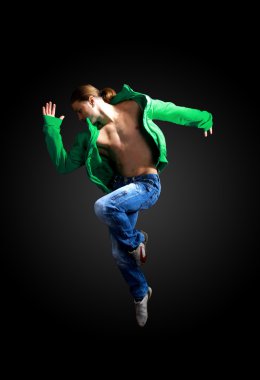 Modern dancer poses in front of the old clipart