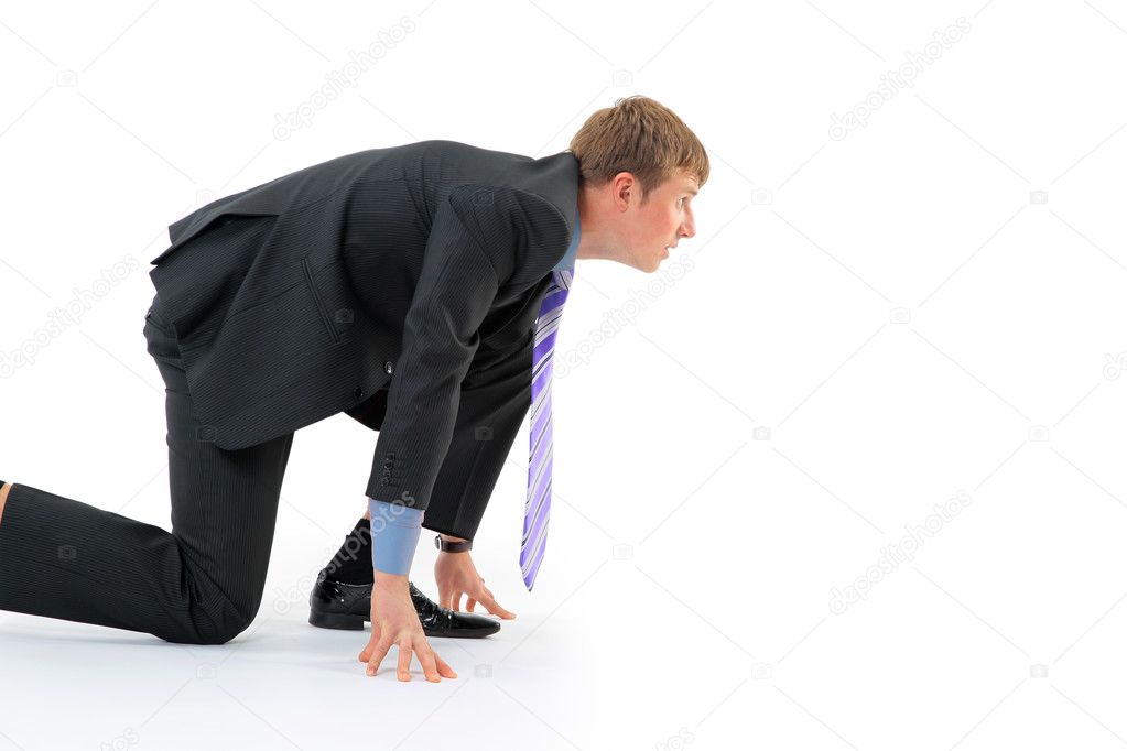 Businessman on starting line isolated over white background