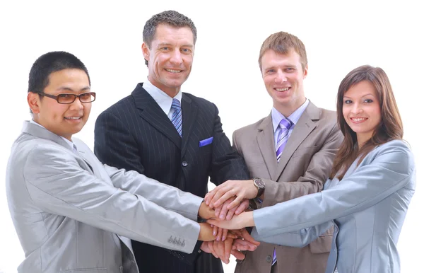 Teamwork en team spirit - handen opgestapeld bovenop elkaar met een multi-e — Stockfoto