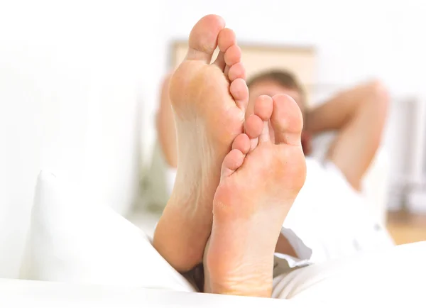 Stock image Closeup portrait of a young man resting on sofa at home